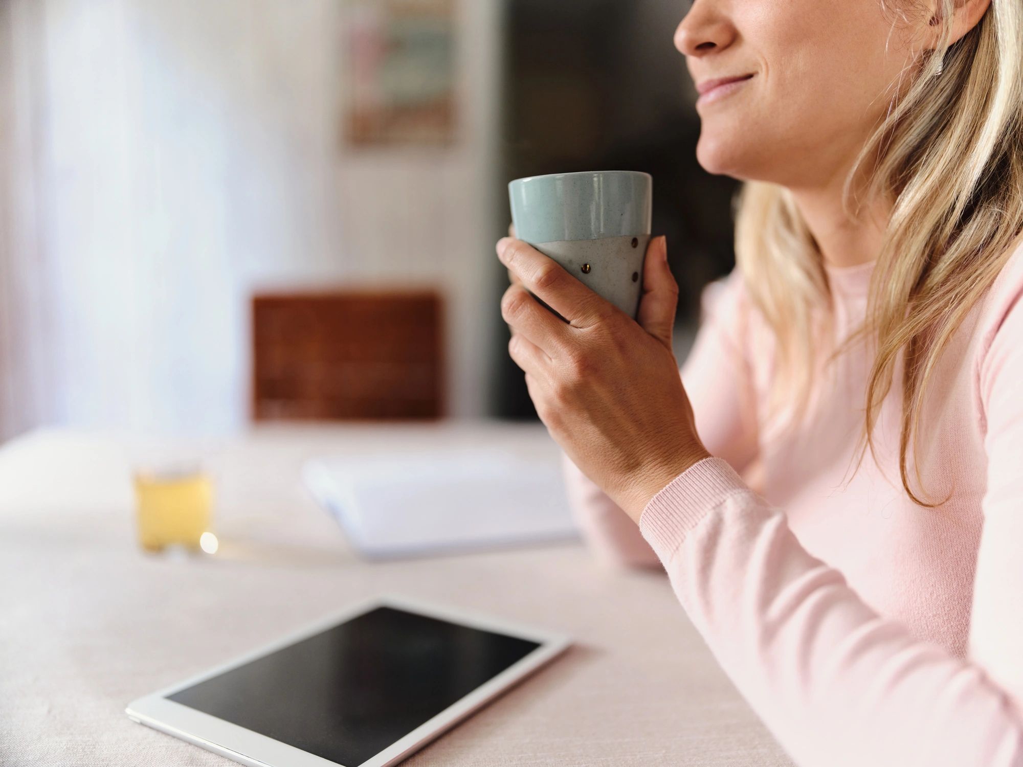 Woman enjoying a quiet coffee moment at home