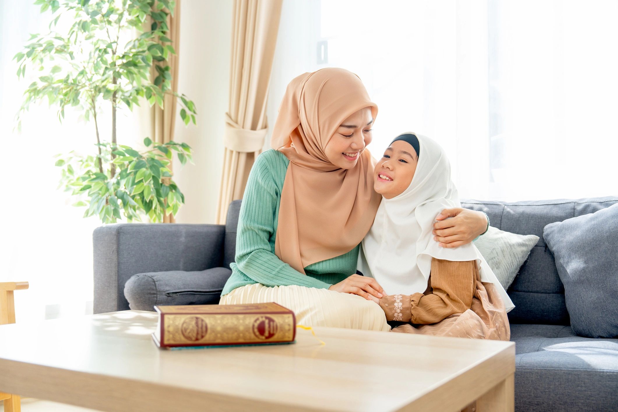 Mother and daughter sharing a warm moment at home